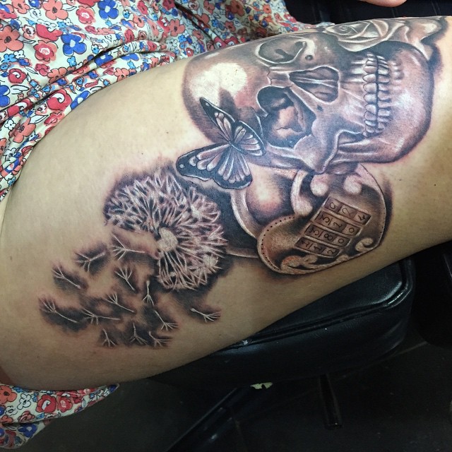 Skull leg tattoo