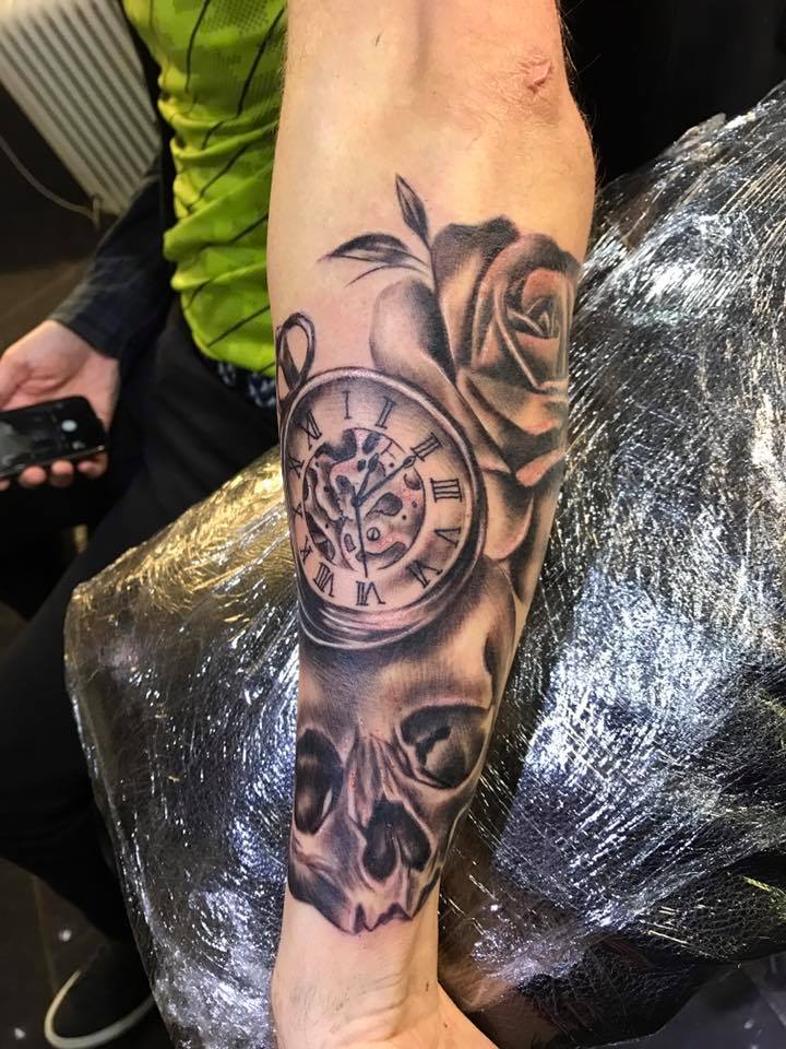 Skull arm tattoo